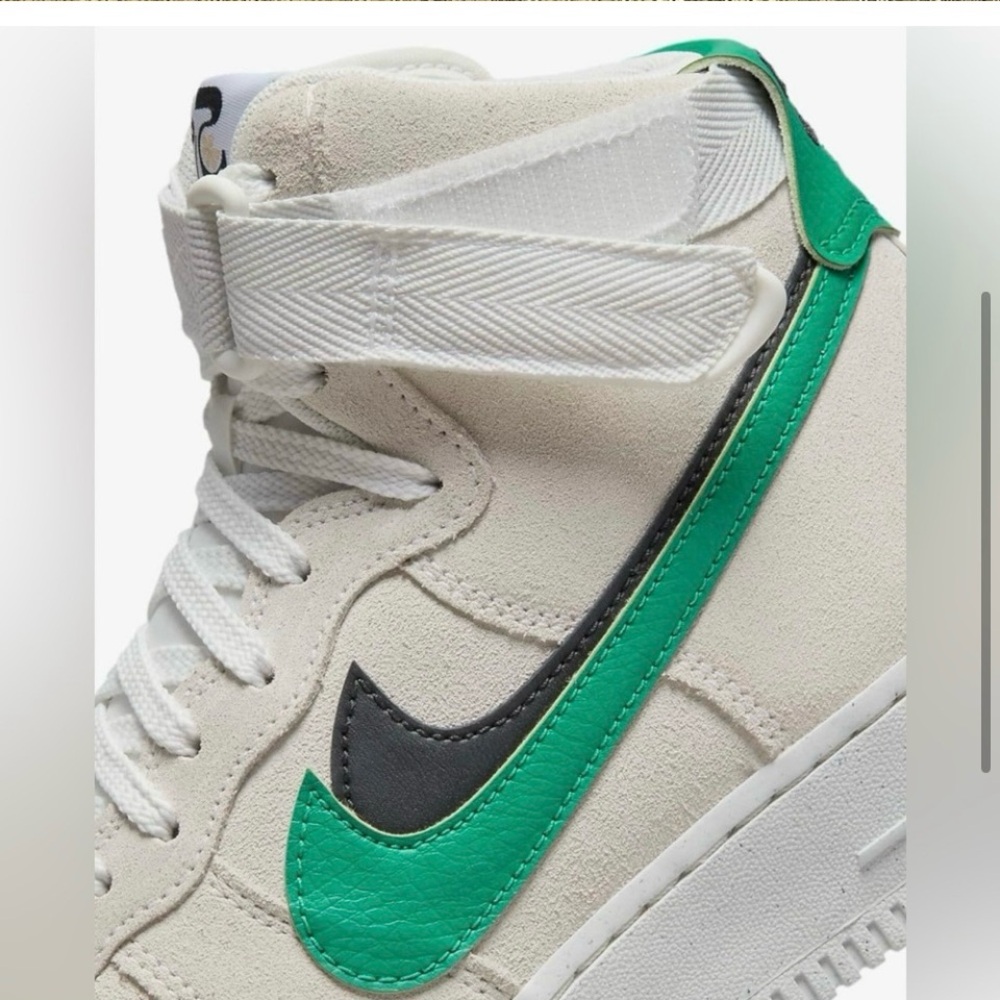 Nike Air Jordan 1 Mid shoes with a Suede & Leather
